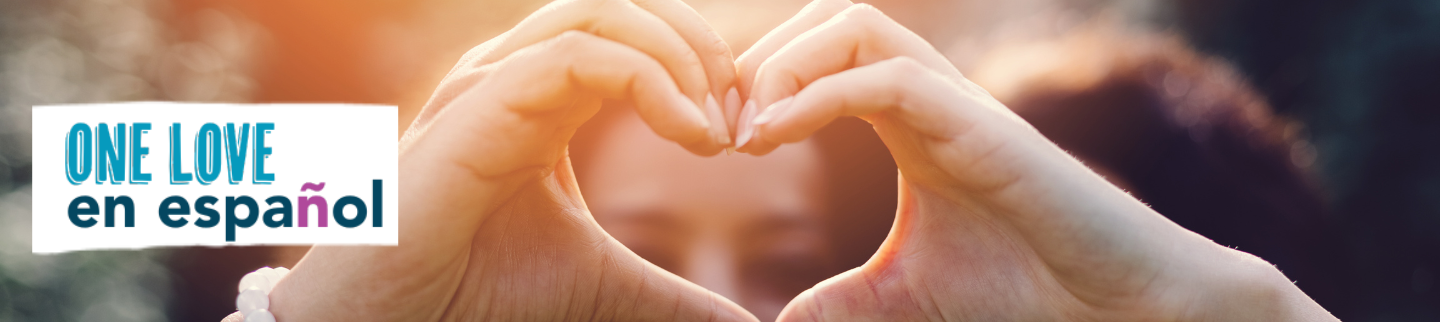 Girl making heart sign with her hands